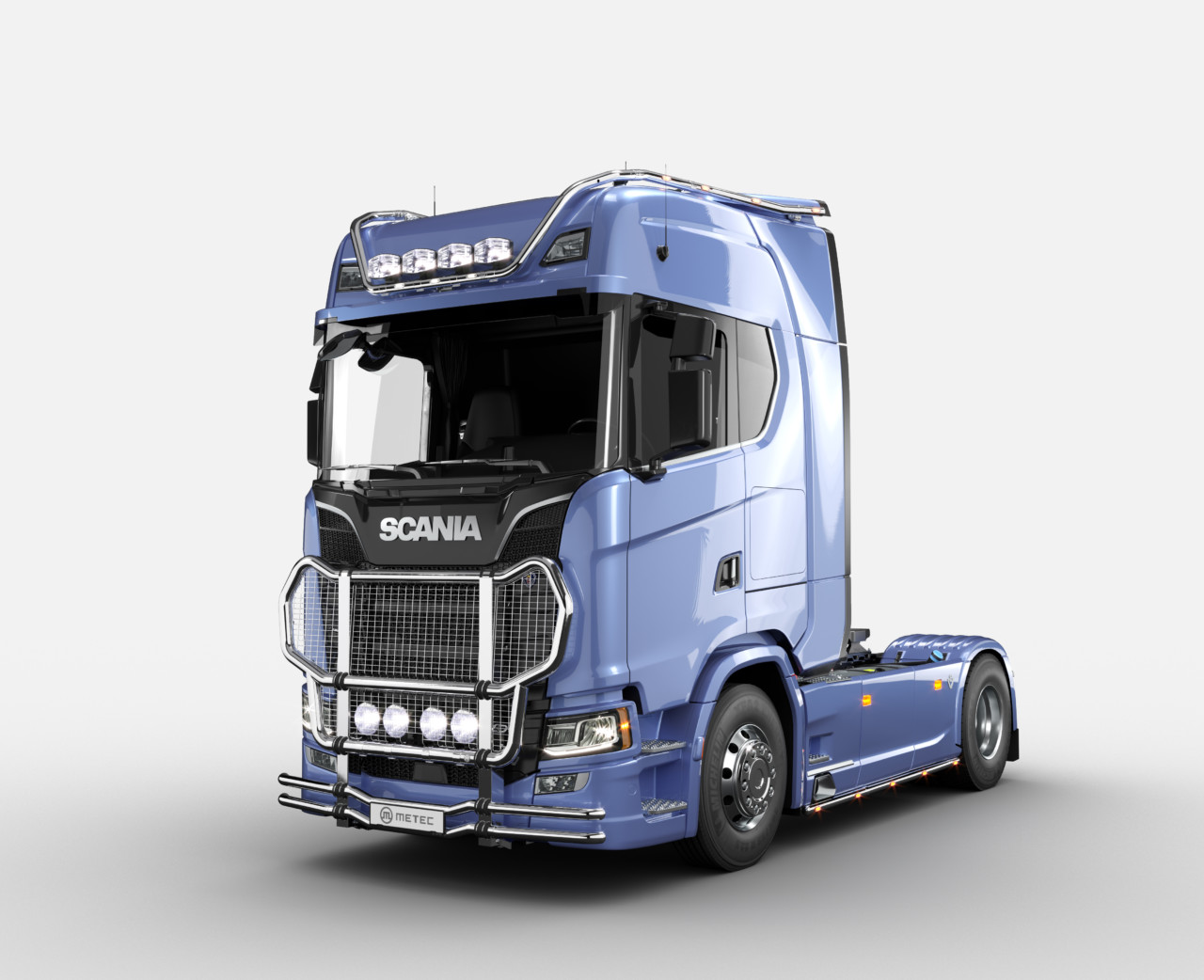 Blue Scania truck with added Metec accessories for road safety.